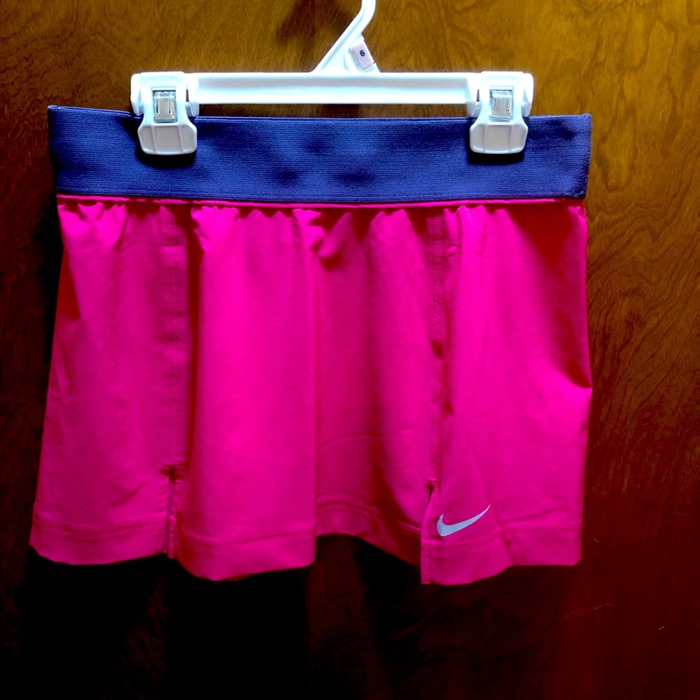 Nike raspberry tennis skirt size S $20 original price $ 45